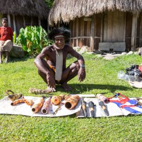 Yali man selling his products